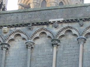 carved heads on the north wall of the cathederal